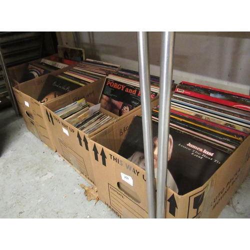 259 - Four boxes containing a large collection of various 20th Century records, including various LPs and ... 