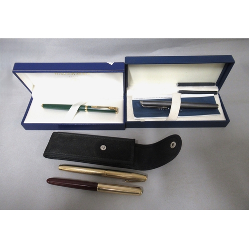 317 - Two cased Waterman fountain pens, together with two other pens