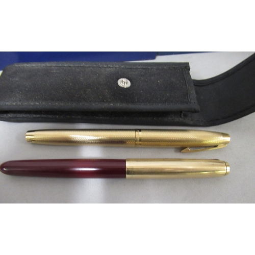 317 - Two cased Waterman fountain pens, together with two other pens