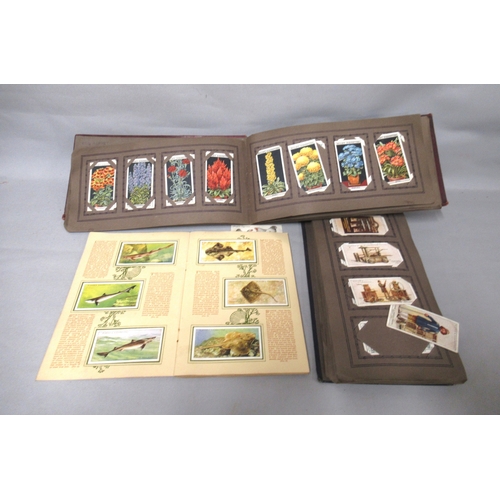 330 - Box containing a collection of miscellaneous cigarette cards in various albums