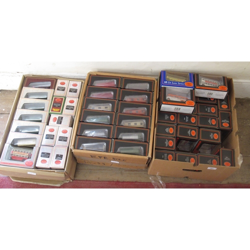 467 - Three boxes containing a quantity of Exclusive First Edition 1/76th scale buses, coaches etc.