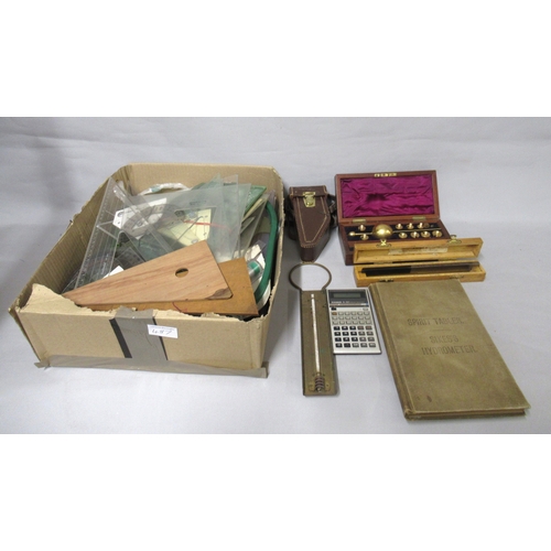 Two boxes containing a quantity of scientific instruments, calculators ...