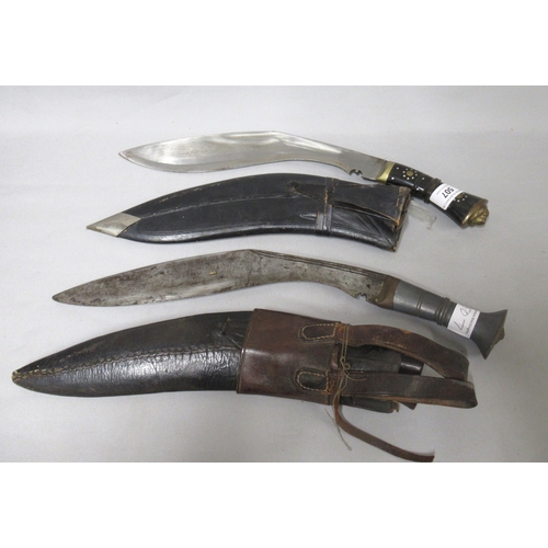 507 - 25 Gurkha Regiment kukri with metal grip, together with another