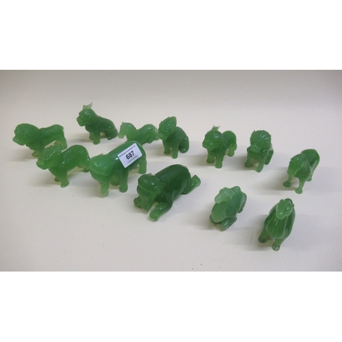 687 - Group of twelve Chinese green glass figures of animals