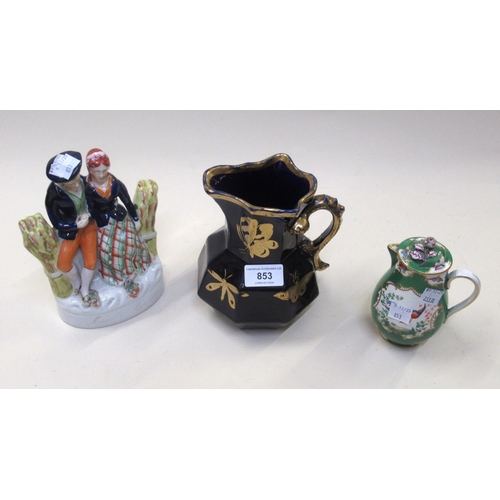 853 - Masons type blue and gilt decorated jug, Staffordshire group of seated figures and an English bird a... 