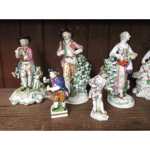 924 - Collection of nine 18th / 19th Century English pottery and porcelain figures, including Derby, Chels... 