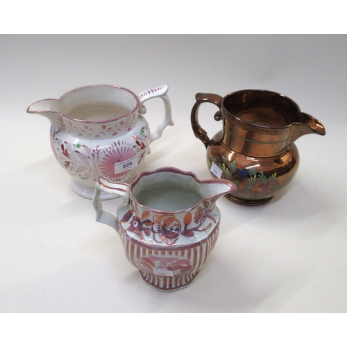926 - Two Sunderland lustre jugs, together with another