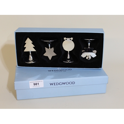 981 - Two boxed sets of four Wedgwood silver plated name place holders