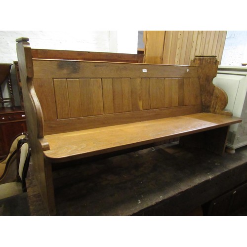 2009 - Oak church pew with panel back and seat on slab supports, 165 x 55 x 115cm