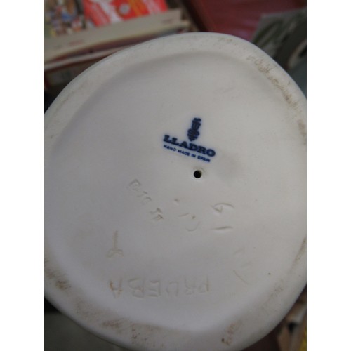 929 - Group of four various Lladro figures