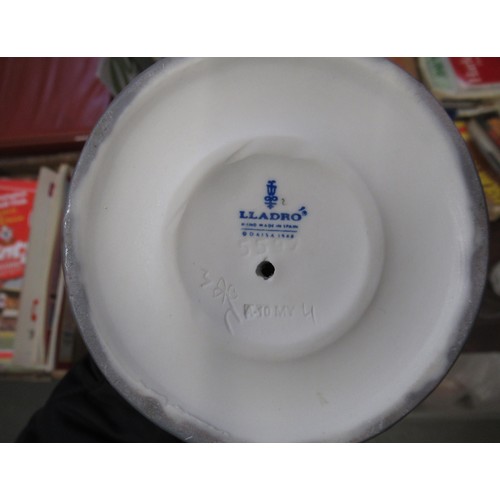 929 - Group of four various Lladro figures