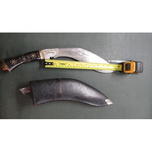 507 - 25 Gurkha Regiment kukri with metal grip, together with another