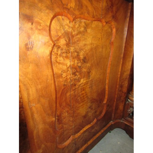 1828 - 19th Century walnut marquetry inlaid Davenport, the fall front enclosing a fitted interior above a s... 