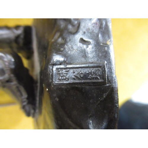 2197 - Genryusai Seiya (Japanese Meiji period), dark patinated bronze figure, man wearing a wide brimmed ha... 