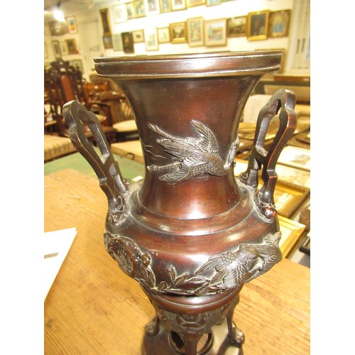 1697 - Late 19th Century Japanese dark patinated bronze two handled vase decorated in high relief with bird... 