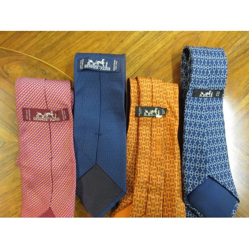 162 - Four Hermes silk ties, together with three others Salvatore Feragamo, Cadogan and Armani