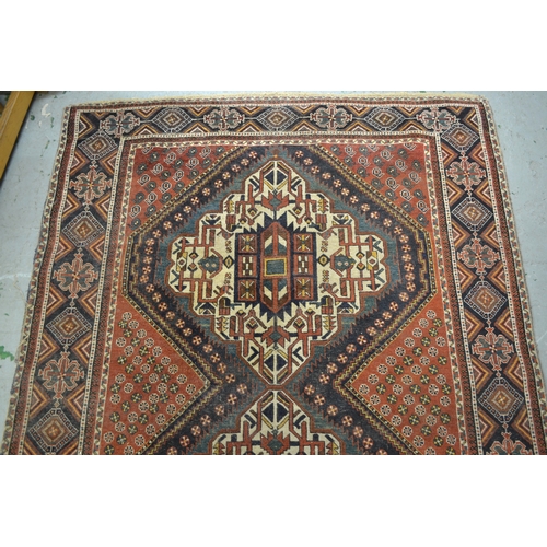 1 - Antique Afshar rug with a twin medallion design on a red ground with borders, 192 x 148cm approximat... 