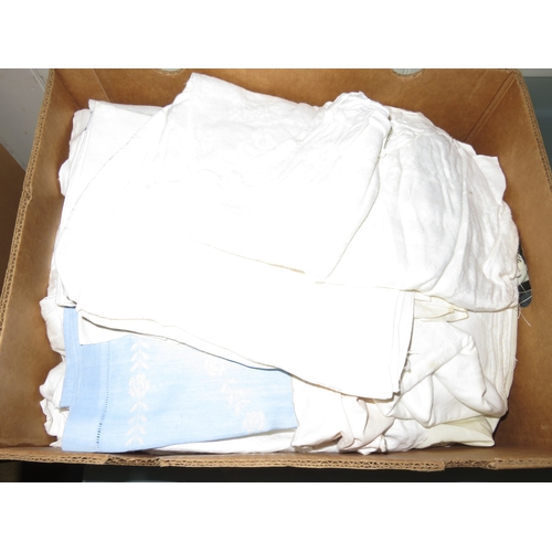 36 - Two boxes containing a quantity of table linen