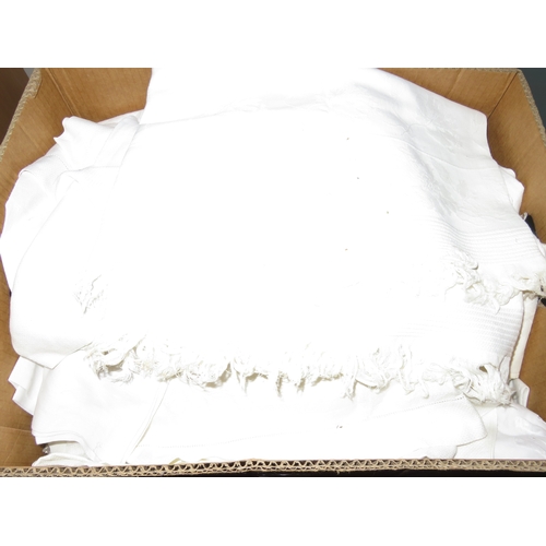 36 - Two boxes containing a quantity of table linen