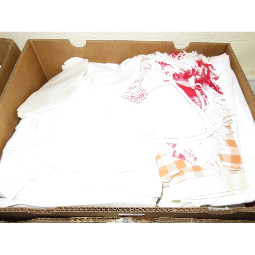 37 - Two boxes containing a quantity of miscellaneous table linen