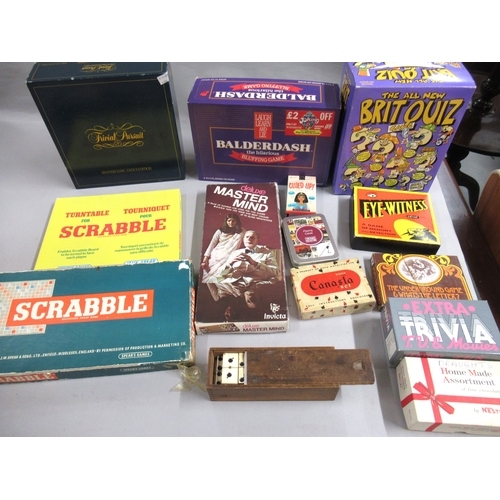62 - Two boxes containing a large quantity of 20th Century games including Monopoly, Cluedo, Trivial Purs... 