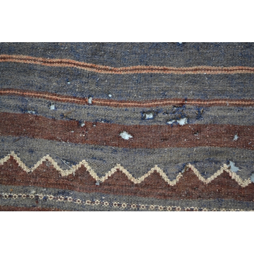 7 - Antique South West Persian rug with a banded meander design in shades of red, blue, yellow, cream an... 