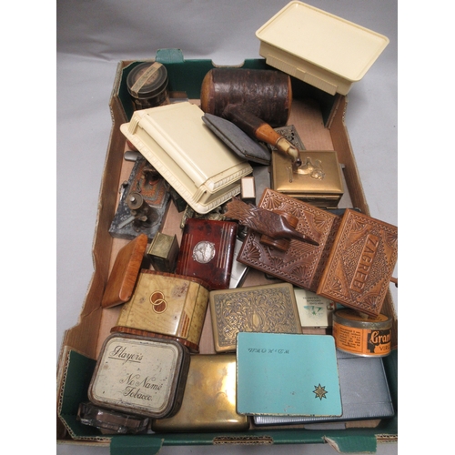 297 - Cold painted metal match striker in the form of a snake charmer, various cigarette dispensers, pipes... 