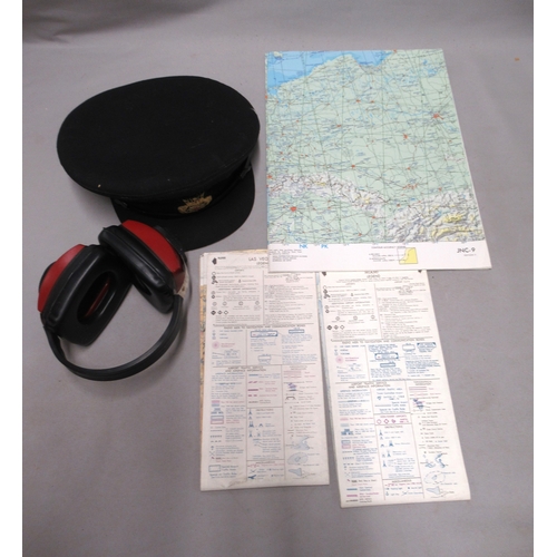 320 - Pilot's cap, rank insignia, ear defenders and a quantity of aeronautical ephemera, including charts ... 