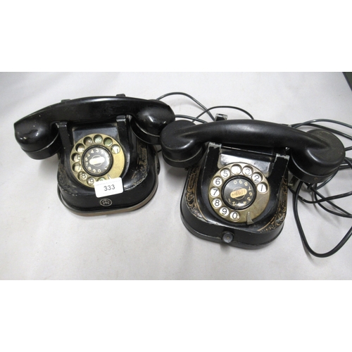 333 - Two Continental black metal telephones by Bell Telephone Company and FTR Company