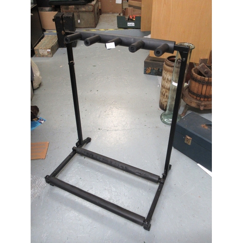 343 - Three various guitars, including a Johnson, together with a metal guitar stand