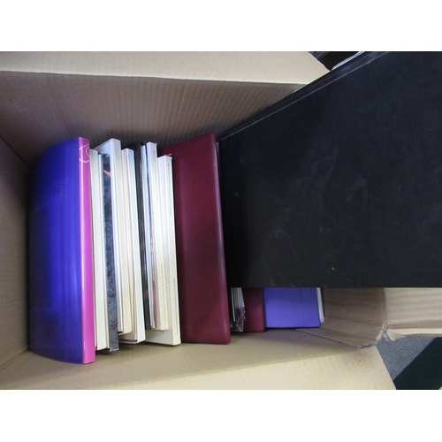 380 - Large collection of World stamps housed in albums and stock books in four boxes