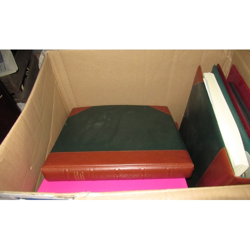 380 - Large collection of World stamps housed in albums and stock books in four boxes