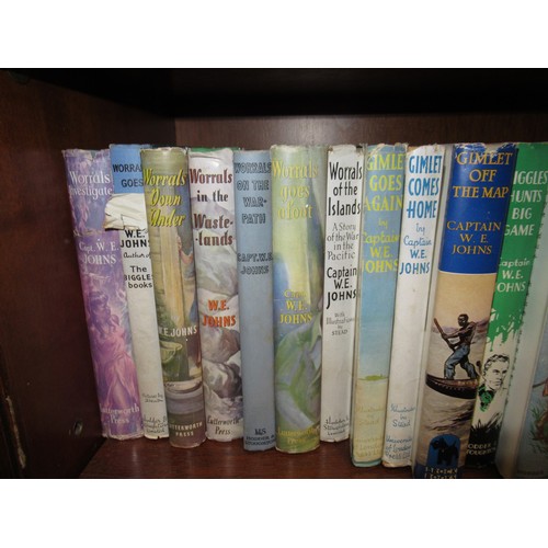 404 - Captain W. E. Johns, quantity of Biggles volumes with dust jackets, some First Editions
