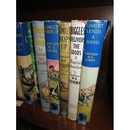 404 - Captain W. E. Johns, quantity of Biggles volumes with dust jackets, some First Editions