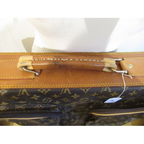 46 - Vintage Louis Vuitton garment carrier bag crafted from the brand's signature monogram canvas with le... 
