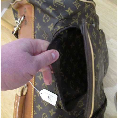 46 - Vintage Louis Vuitton garment carrier bag crafted from the brand's signature monogram canvas with le... 