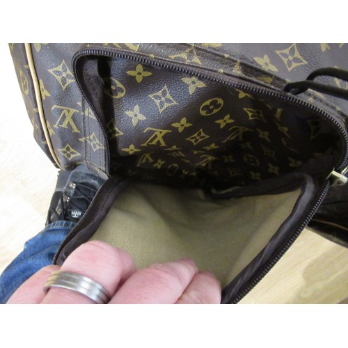 46 - Vintage Louis Vuitton garment carrier bag crafted from the brand's signature monogram canvas with le... 