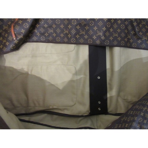 46 - Vintage Louis Vuitton garment carrier bag crafted from the brand's signature monogram canvas with le... 