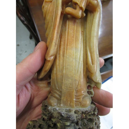 84 - Carved soapstone group of birds, together with a carved soapstone figure of a Chinese deity