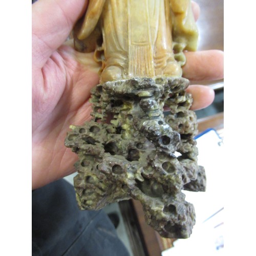 84 - Carved soapstone group of birds, together with a carved soapstone figure of a Chinese deity