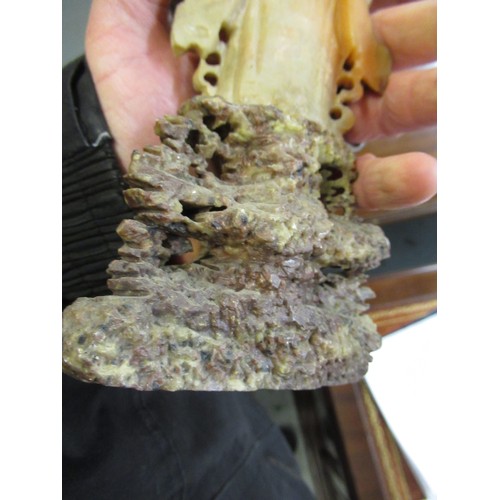 84 - Carved soapstone group of birds, together with a carved soapstone figure of a Chinese deity