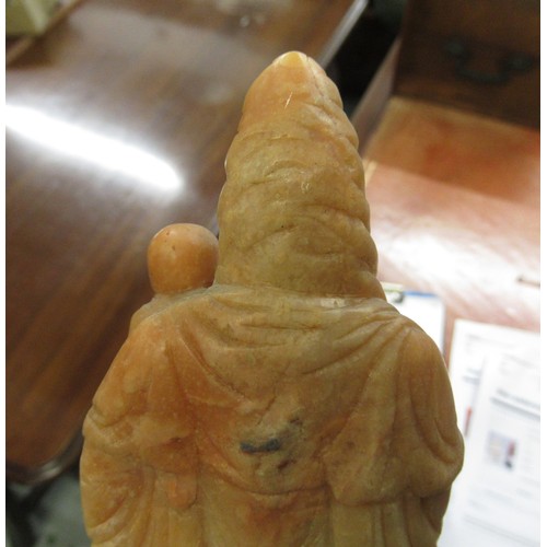 84 - Carved soapstone group of birds, together with a carved soapstone figure of a Chinese deity