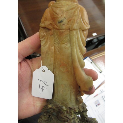 84 - Carved soapstone group of birds, together with a carved soapstone figure of a Chinese deity