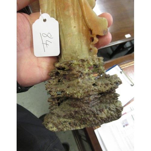 84 - Carved soapstone group of birds, together with a carved soapstone figure of a Chinese deity