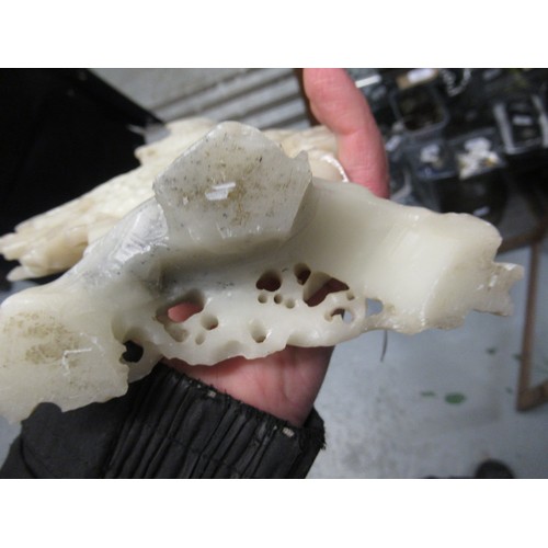 84 - Carved soapstone group of birds, together with a carved soapstone figure of a Chinese deity