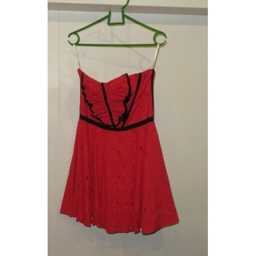 21 - Quantity of Karen Millen clothes including three dresses, a bodice and skirt set, a crystal embellis... 