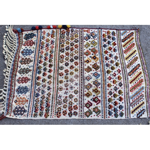 15 - Two flat weave and part piled tribal Kelim rugs of horizontal banded design, 98 x 70cm approximately