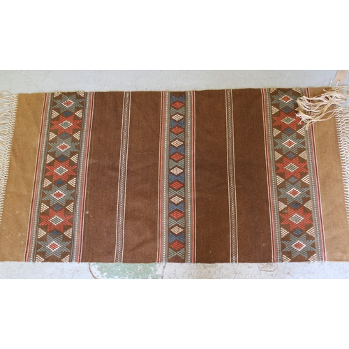 19 - Chinese woollen rug of vase design, together with two tribal wall hangings
