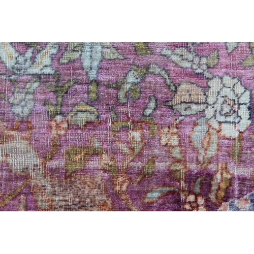 3 - Antique Kayseri rug with all over palmette and animal design on a claret ground with borders, 290 x ... 