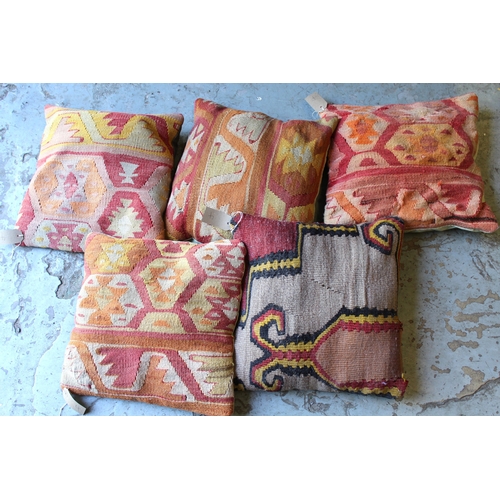 4 - Two Kelim cushions, various similar smaller cushions, two small flat weave mats and various bags